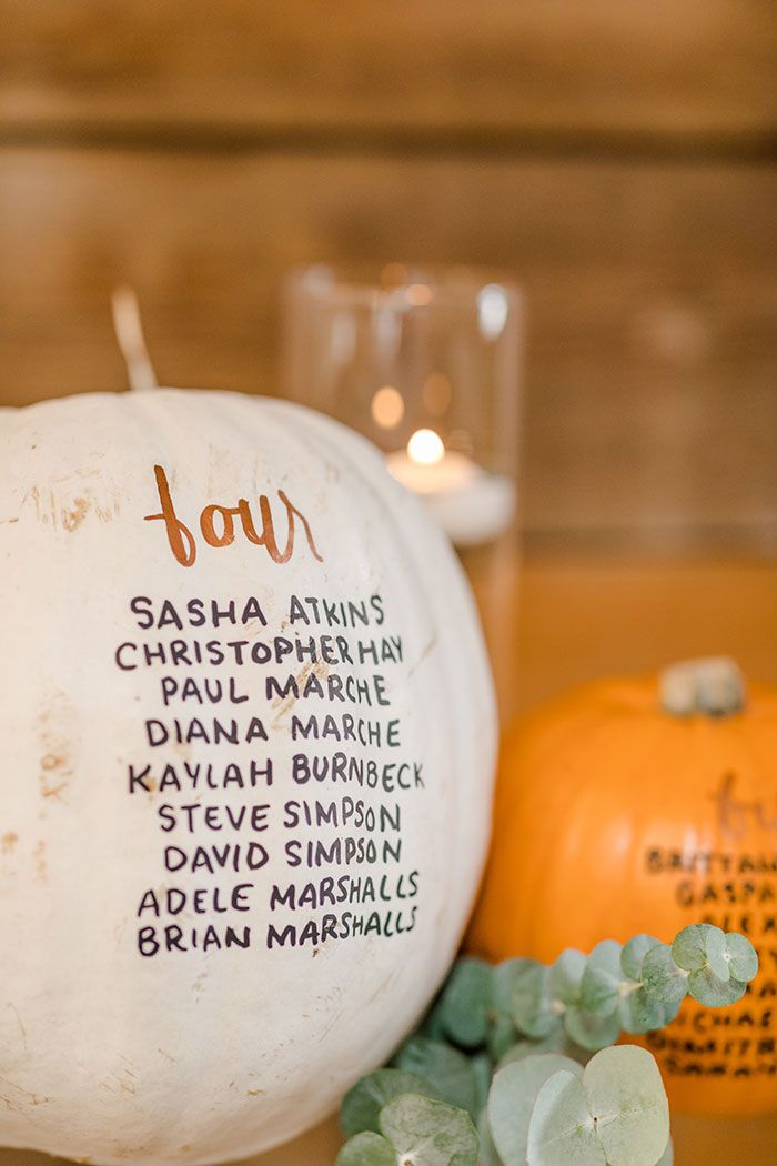 a white pumpkin sitting on top of a table