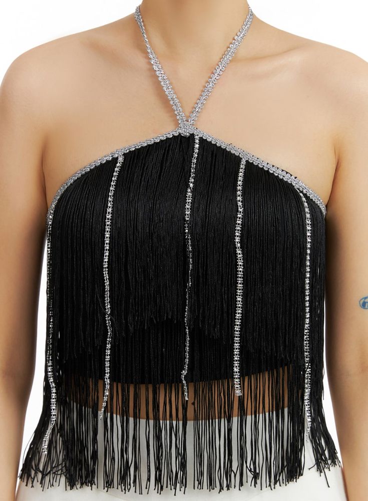 Product Detail Shop our latest women's fashion piece, designed for the party wear or festival occasions. This sexy fringe detail top offers a slim fit for a stylish look. Style : Sexy Occasion : Party wear, Festival Detail : Fringe Material : Polyester Sleeve : Sleeveless Neck : Halter neck Length : Crop Fit : Slim fit Polyester100 Color : Black, White Model Size Model is wearing size S/M and the color Black. Height : 5'6" | 167cm / Top : S / Bottom : S (26 inch) .prddescription table, .prddescr Fitted Halter Top For Club Party, Fitted Halter Top For Club And Party Season, Glamorous Fitted Halter Top For Club, Embellished Halter Top For Party, Chic Embellished Halter Top For Parties, Glamorous Halter Top For Club And Party Season, Summer Party Halter Top With Fringe, Summer Fringe Halter Top For Party, Halter Neck Top For Club And Party Season