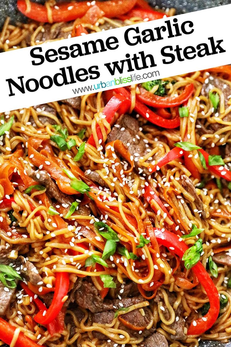 sesame garlic noodles with steak and peppers in a skillet