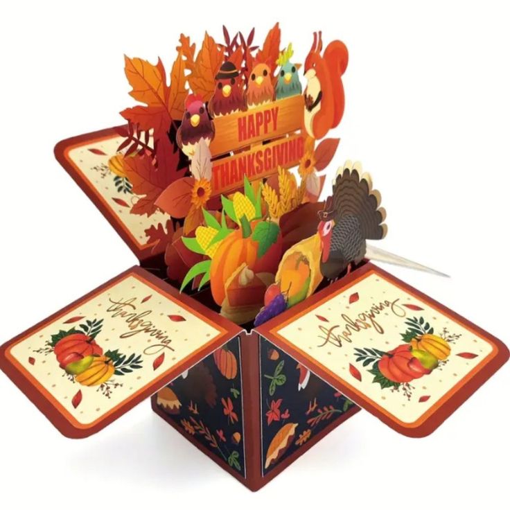 a 3d thanksgiving card with turkeys, leaves and pumpkins on the front is cut out to look like an origami