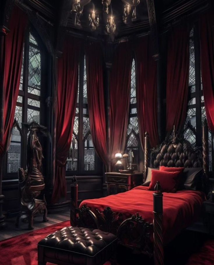 a bedroom with red curtains and a fancy bed