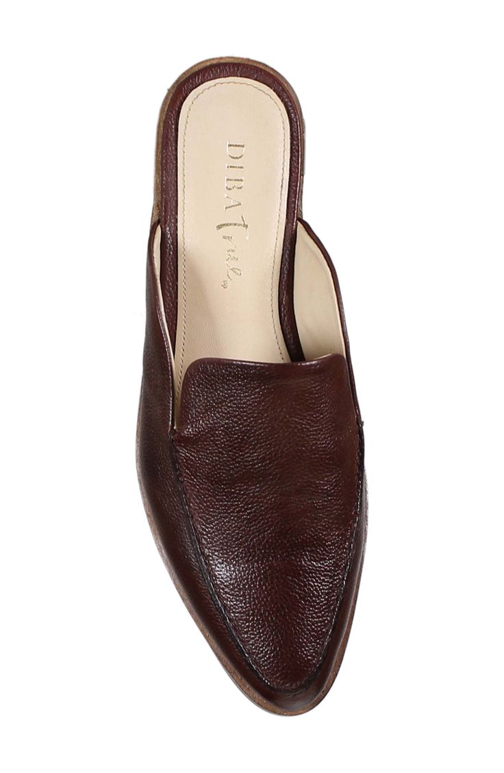 Metallic leather brings a dose of glam to a loafer-mule grounded on a low stacked heel. 1" heel Leather upper/synthetic lining and sole Imported Fall Evening Slip-on Mules, Chic Formal Slip-ons With Low Heel, Elegant Leather-lined Pointed Toe Slip-ons, Leather Mules With Deep Heel Cup, Classic Low Heel Mules With Branded Insole, Classic Mules With Branded Insole And Low Heel, Classic Office Mules With Deep Heel Cup, Office Slip-on Mules With Flat Heel, Low Heel Mules With Stacked Heel For Work