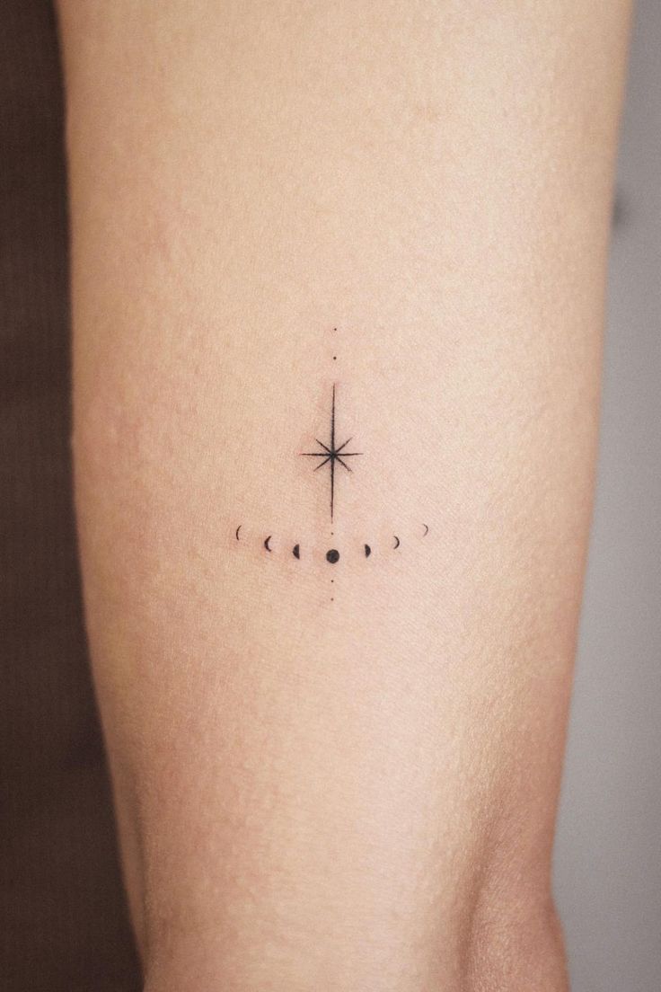 a woman's thigh with an arrow and stars tattoo on her left side ribcage