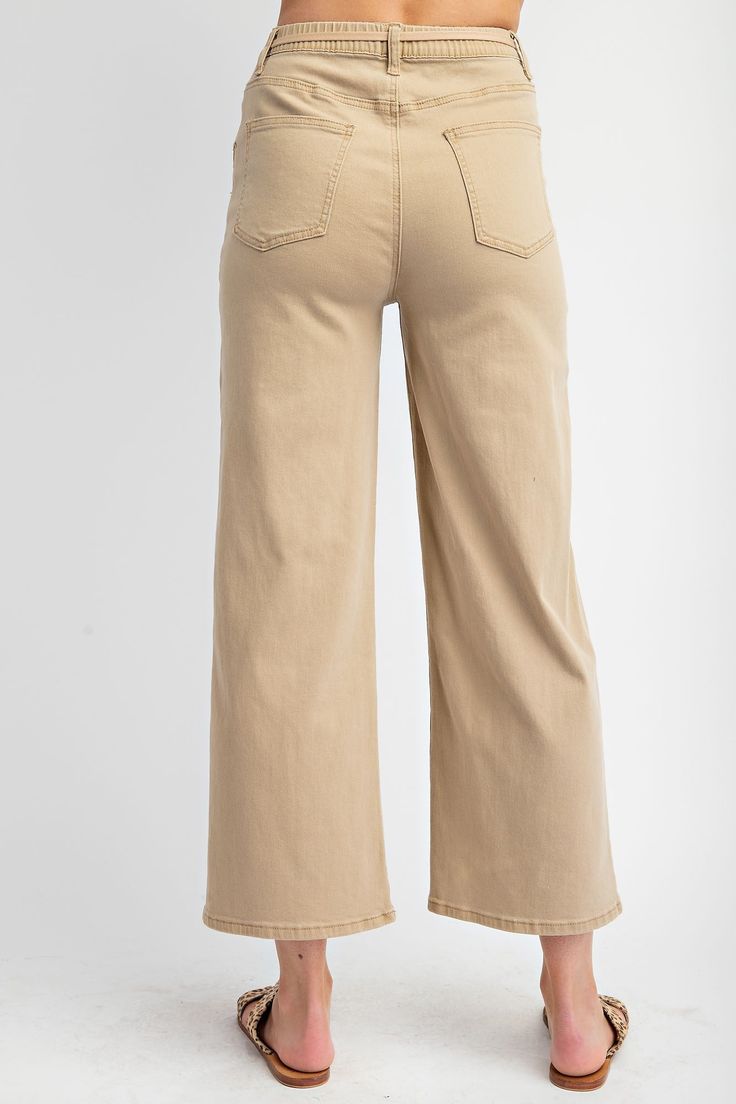 Introducing the Jaycie Tie-Belt Utility Pants, the perfect addition to your wardrobe. These pants feature a front zipper and button closure for a secure fit, while the self-tie belt adds a touch of style. With a straight leg fit and finished hem, these pants are both flattering and versatile. Made from stretch twill fabric, they offer a comfortable and flexible fit. Upgrade your wardrobe with the Jaycie Tie-Belt Utility Pants, available now! Stretch Twill Washed Front Zipper and Button Closure E High-waist Utility Pants With Belt Loops, Khaki High-waisted Pants With Welt Pockets, Khaki Ankle-length Wide Leg Pants With Elastic Waistband, Khaki Full-length Pants With Welt Pockets, Khaki Straight-leg Pants With Welt Pockets, Belt Tying, Utility Pants, Twill Fabric, Tie Belt