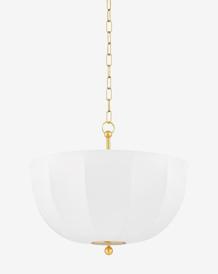 a large white bowl hanging from a gold plated chandelier on a chain