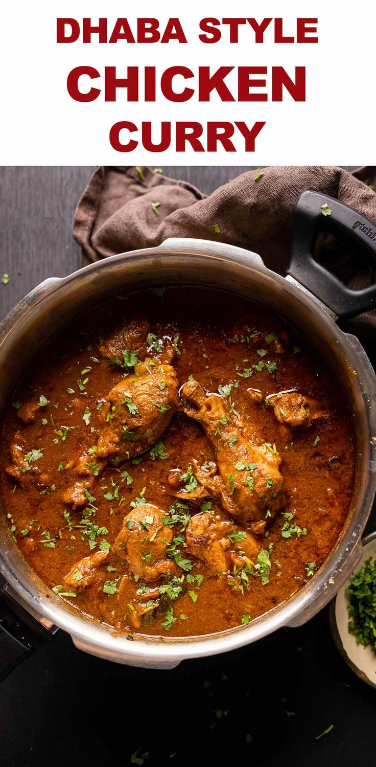 chicken curry in a pan with herbs on top and the words, dhab style chicken curry