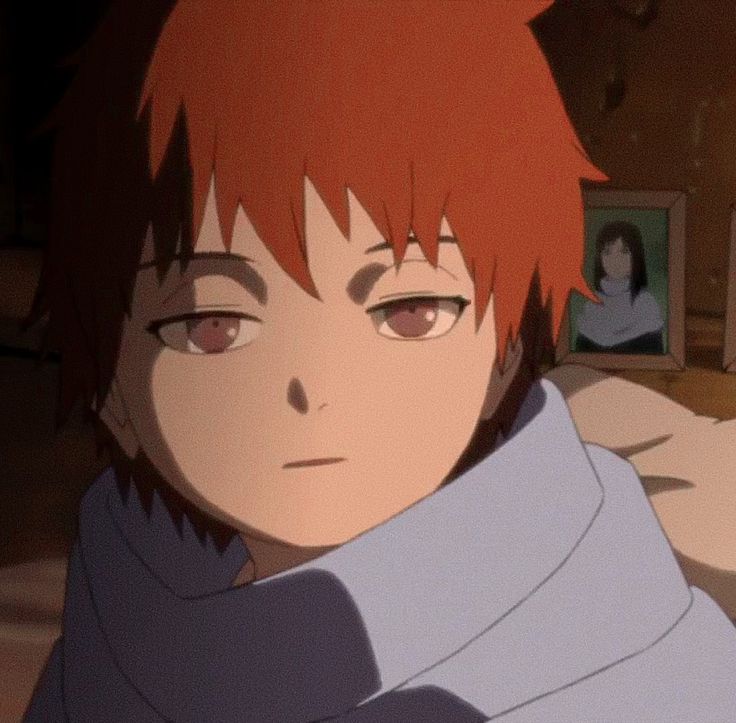 an anime character with red hair looking at the camera while holding his arm around him