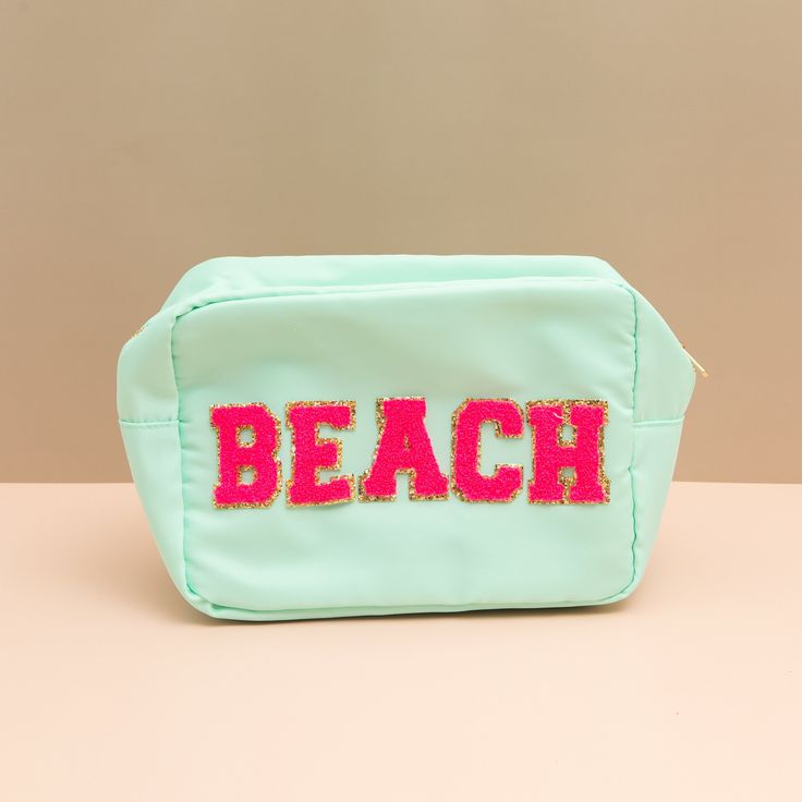 Customised Pouches for Travel and everyday life.  Large Mint Pouch with Hot Pink letters - BEACH. For all your beach or pool side accessories. Enough room for your book, hat, sunscreen and phone. Or use it as a wet bather bag and prevent everything else in your beach bag from getting wet! Size: 27.5cm x 20.5cm x 12.5cm Trendy Summer Travel Pouch, Rectangular Beach Pouch For Summer, Trendy Beach Pouch For Summer, Trendy Letter Print Beach Bag For Travel, Pink Travel Pouch For Summer, Pink Pouch For Summer Travel, Rectangular Summer Beach Pouch, Green Travel Pouch Beach Bag, Trendy Summer Beach Pouch