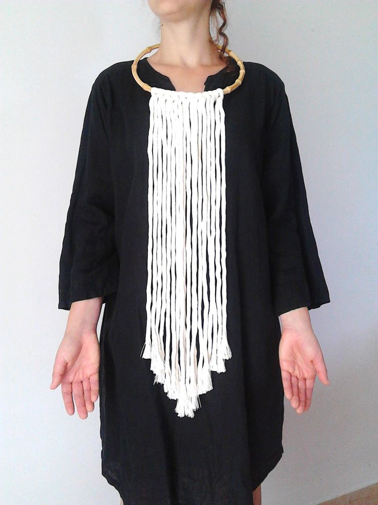 Fringes length : 23 inches. Choker diameter : 8 inches. Color : Off white. Availabe in yellow. Long tribal boho necklace with off white cotton fringes in wood choker. There is no closure. Just put it over the head. It's very soft and lightweight. A realy statement piece. Composition: I always use natural materials, in this case cotton cords. The materials I use, are made from a small local traditional company. They use natural products such as cotton, silk and viscose and they love colors. The m Bohemian Fringe Necklace, White Long Chain Necklace, Handmade Bohemian White Long Necklace, Handmade Bohemian Long White Necklace, White Long Festival Necklaces, White Long Necklace For Festivals, Bohemian White Handmade Long Necklace, Bohemian White Necklaces For Festival, White Macrame Necklace For Festival