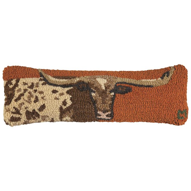 a long horn steer hooked up to a door mat on a white background with an orange border