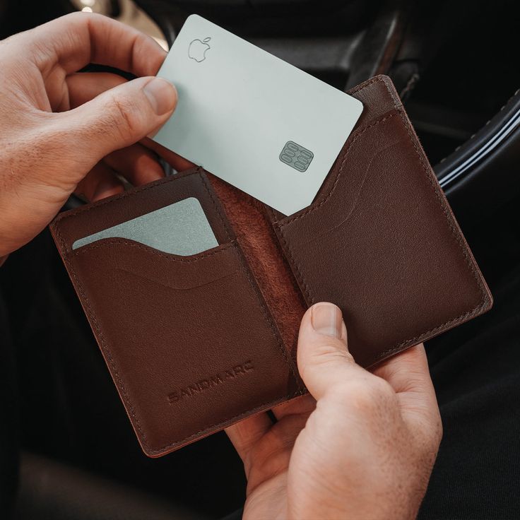 Our full-grain leather wallet, crafted with a unique magnetic enclosure, caters to those seeking a refined minimalism with the capacity to store up to 15 cards. A blend between modern and classic design, the Everyday Leather Wallet provides the luxury of more cards without any trade-offs.* *This an everyday wallet, not a MagSafe wallet. Minimal Leather Wallet, Full Grain Leather Wallet, Magsafe Wallet, Leather Craft, Full Grain Leather, Leather Wallet, Classic Design, Black And Brown, Grain