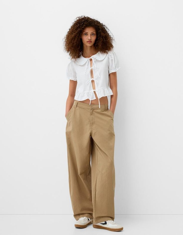 Cotton balloon pants - Jeans - Women | Bershka Trendy Tapered Leg Parachute Pants For Work, Chic Parachute Pants With Pockets, Chic Parachute Pants With Elastic Waistband And Tapered Leg, Spring Wide-leg Relaxed Fit Cargo Pants, Chic Baggy Parachute Pants For Summer, Baggy High-waisted Pants For Day Out, Casual High-waisted Cargo Pants For Day Out, Spring Wide-leg Chinos, Trendy Wide Leg Bottoms For Daywear