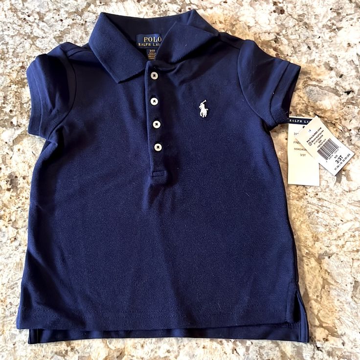 Toddler Ralph Lauren Navy Polo Shirt Size 3t New With Tags Navy Short Sleeve Ralph Lauren Top, Navy Ralph Lauren Short Sleeve Tops, Ralph Lauren Navy Short Sleeve Tops, Blue Cotton Ralph Lauren Polo Shirt, Fitted Blue Ralph Lauren Polo Shirt, Ralph Lauren Fitted Blue Polo Shirt, Blue Ralph Lauren Cotton Tops, Ralph Lauren Blue Collared Top, Baby Polo