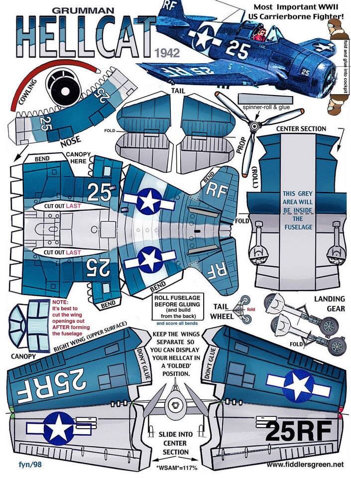 the blue fighter plane paper model is cut out and ready to be used as an art project