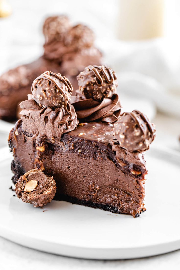 a piece of chocolate cheesecake on a white plate