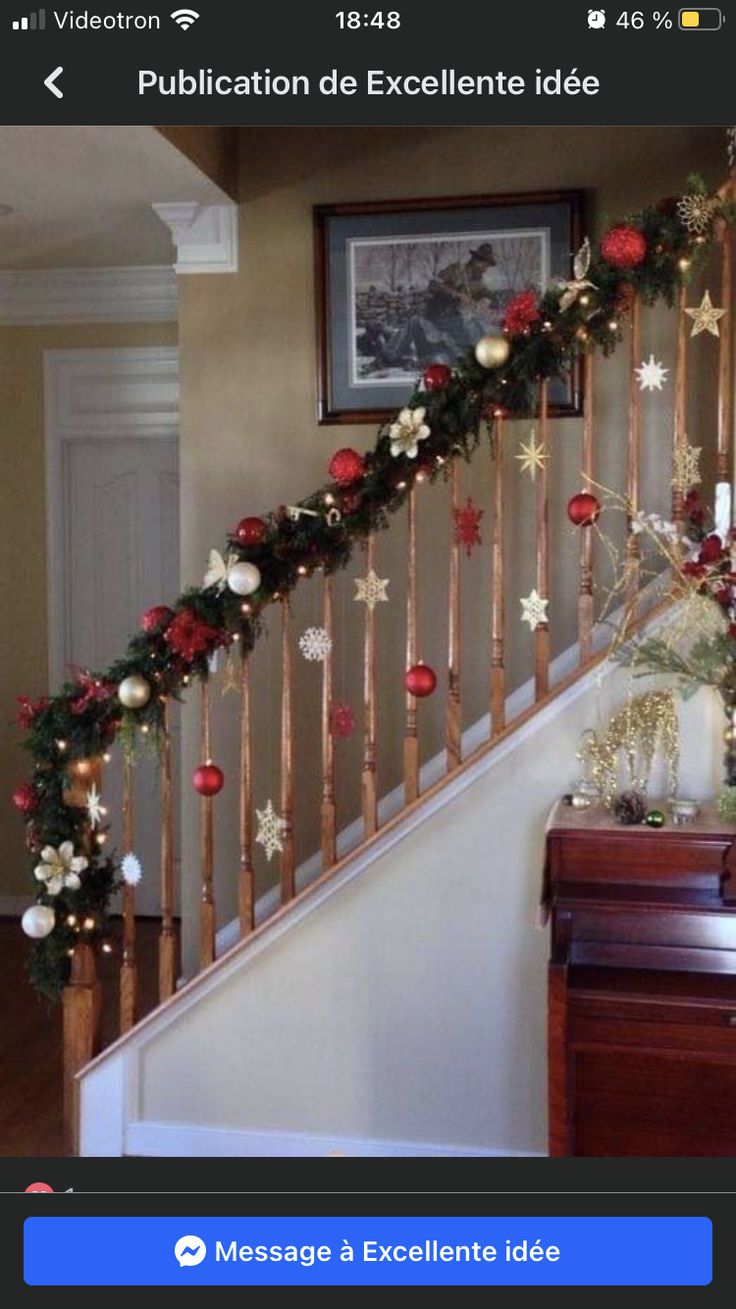 a staircase decorated with christmas decorations and garland