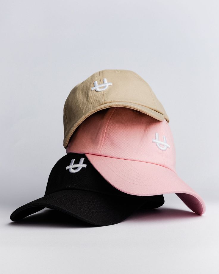 Get your head in the game with UPPPER’s Pink Original U Cap. This sleek cap features a 3-D U-logo embroidery, allowing you to showcase your favorite fitness gear brand wherever you go. Designed for comfort, it includes an adjustable strap with a custom slider featuring the UPPPER logo, ensuring a perfect fit for every head. The cap is crafted with a soft, unstructured crown, providing a relaxed fit and a trendy look, and is made of 100% cotton for breathability and durability. It's the perfect a Sporty Six-panel Trucker Hat With Embroidered Logo, Sporty Snapback Hat With Embroidered Logo And Curved Bill, Pink Sporty Baseball Cap With Curved Visor, Sporty Pink Baseball Cap With Curved Visor, Adjustable Sporty Baseball Cap With Curved Visor, Adjustable Sports Dad Hat With Embroidered Logo, Sporty Curved Brim Visor For Sports, Pink Dad Hat With Curved Brim For Sports, Pink Curved Brim Dad Hat For Sports