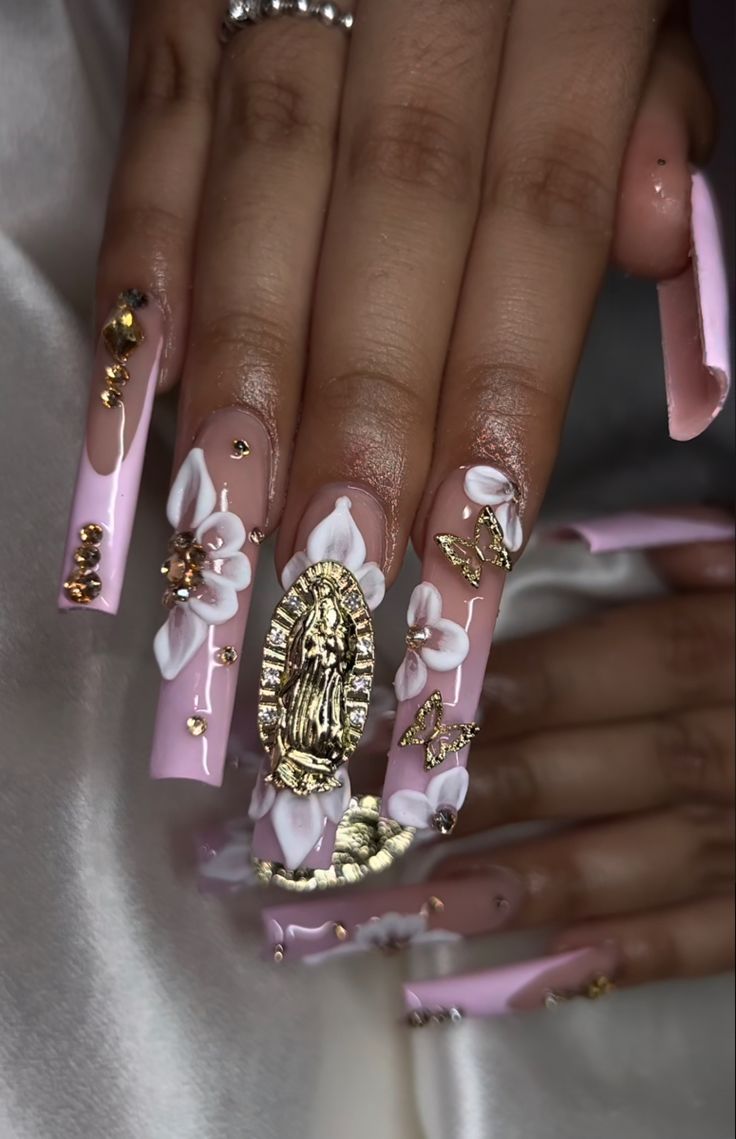 Latina Nails With Gems, Guadalupe Nail Designs, Dramatic Nail Sets, Bling Acrylic Nails With Initial, Pink Quinceanera Nails Long, Nails With San Judas, Virgin Mary Charm Nails, Red San Judas Nails, Acrylic Nails With Virgin Mary