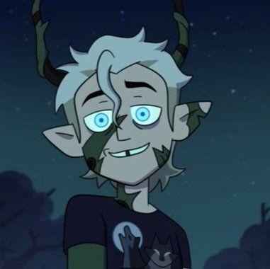 an animated character with blue eyes and horns