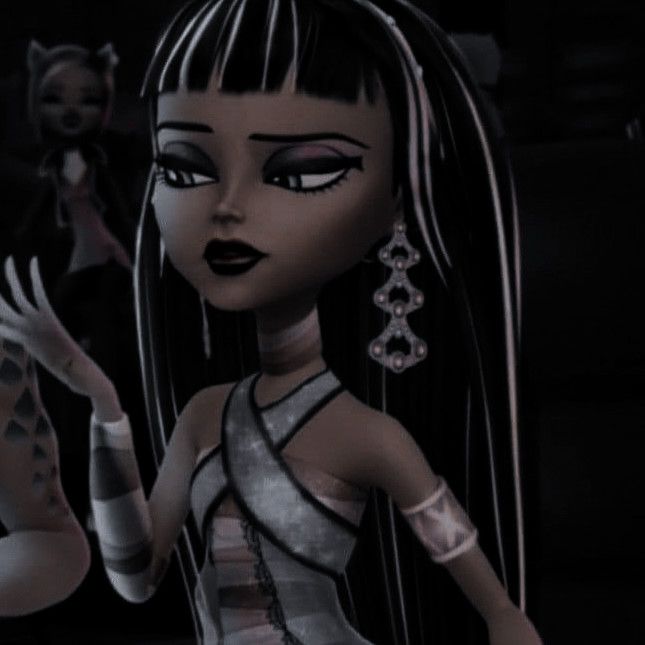 an animated girl with long black hair and white dress standing in front of two other dolls