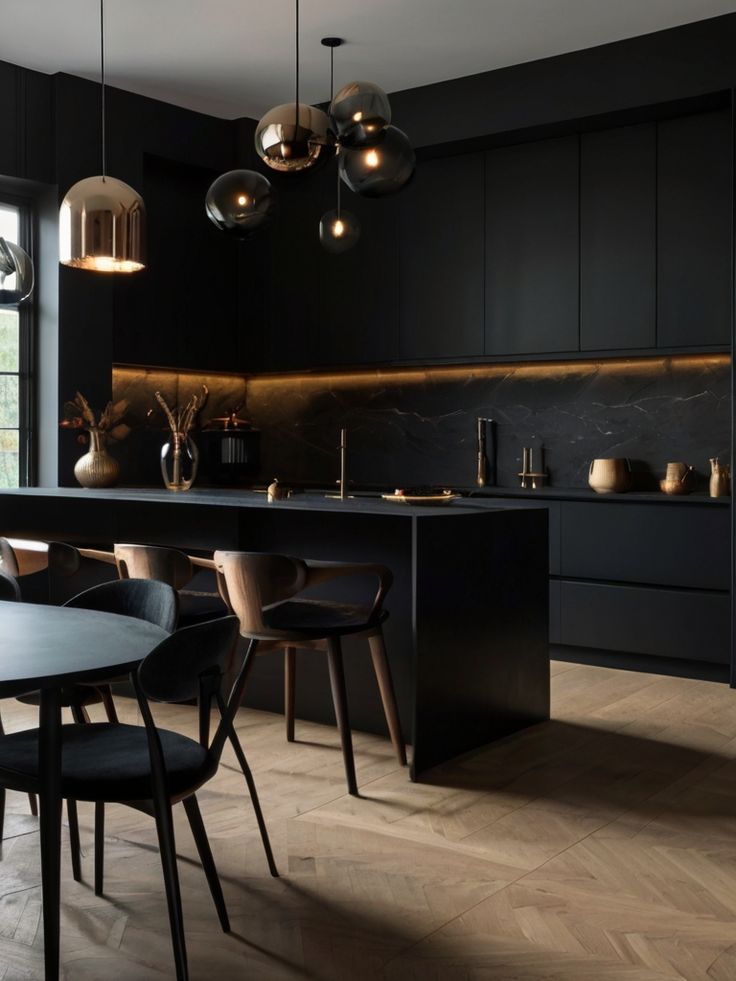 a kitchen with black walls and wooden flooring is pictured in this image, there are several lights hanging from the ceiling