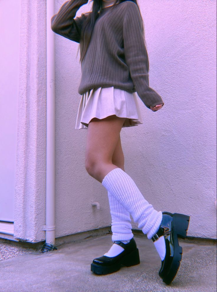 80s inspired winter outfit!! white turtleneck, brown sweater, tan skirt, white legwarmers, black platform mary janes #outfits #outfitoftheday #outfitinspiration #80sfashion #legwarmers #skirtoutfits #winteroutfits #aesthetic #aestheticoutfits Mary Janes Shoes With Leg Warmers, How To Style Black Mary Janes, Outfits With Doll Shoes, Outfits To Go With Mary Janes, Mary Jane Shoes With Leg Warmers, Outfit Inspo With Mary Janes, Cute Legwarmers Outfit, Outfits With Platform Mary Janes, Legwarmers Outfit Aesthetic