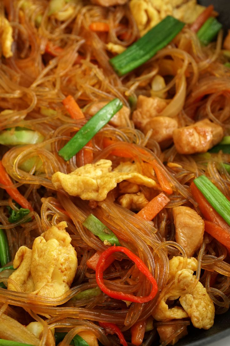 stir fry with vegetables and noodles in a pan