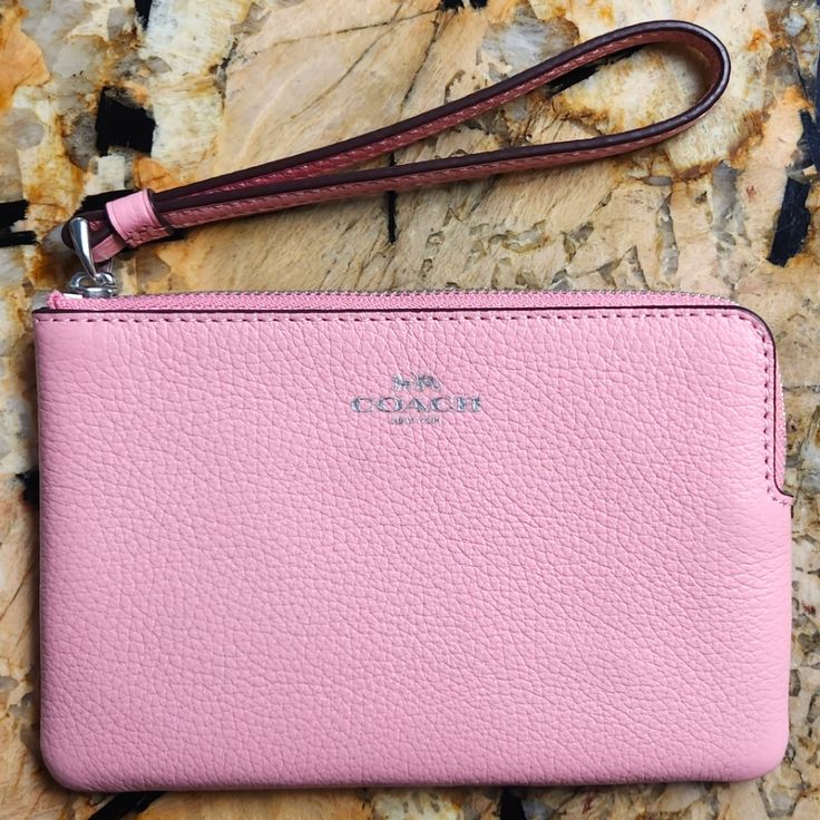 Pink Coach Wristlet. New With Tags. Clutch Wristlet With Zipper Closure, Handheld Wristlet For Everyday Use, Rectangular Wristlet For Everyday Use, Pink Coach Wristlet For Everyday Use, Coach Pink Wristlet For Everyday Use, Coach Rectangular Wristlet With Zipper Pouch, Coach Pouch Wristlet For Everyday Use, Coach Wristlet Pouch For Daily Use, Elegant Pink Coach Wristlet