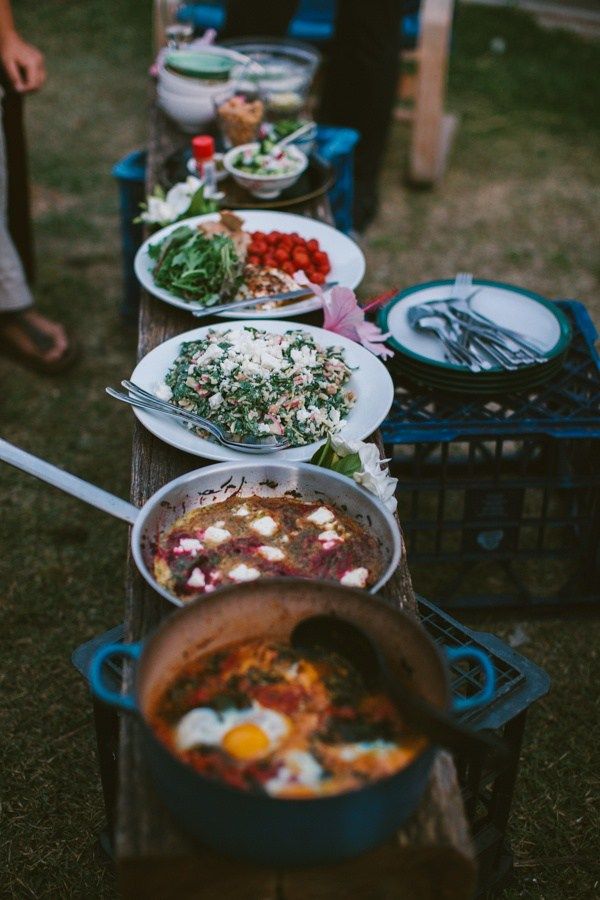 several plates of food are lined up on a table