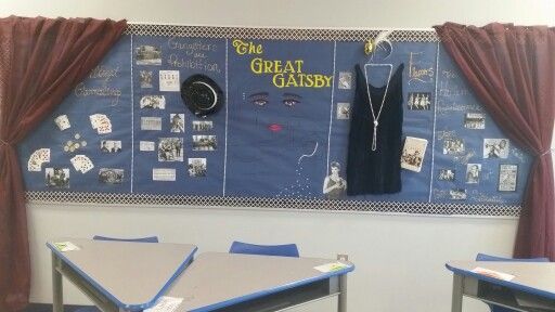 two desks in front of a bulletin board with pictures on it and the words great gatsby written on them