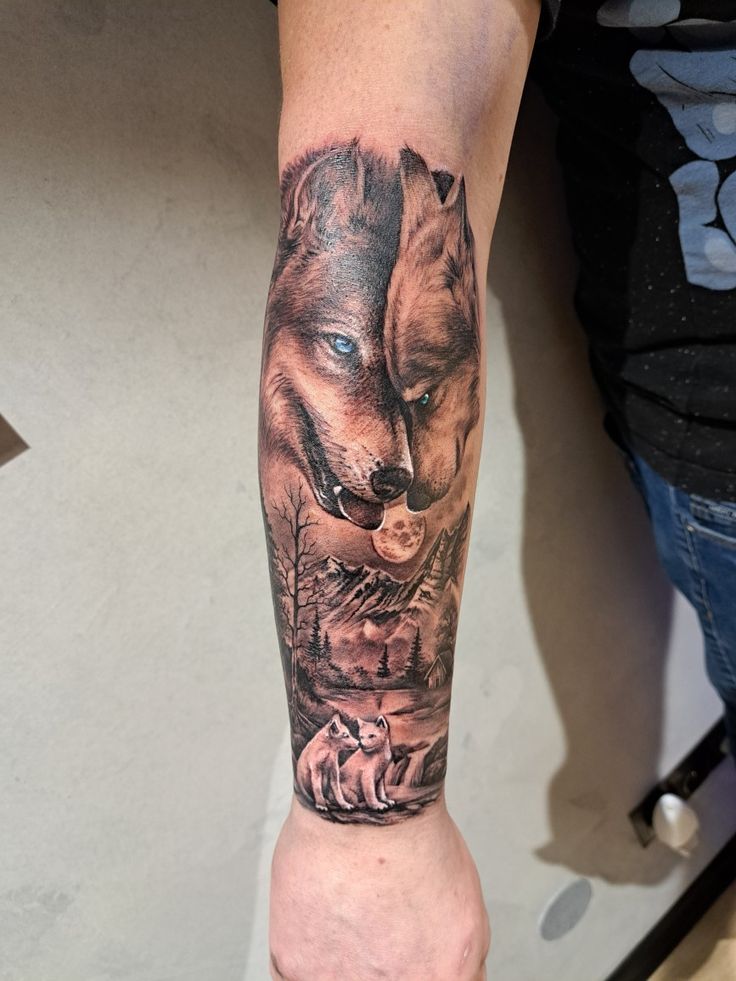 a man with a wolf tattoo on his arm