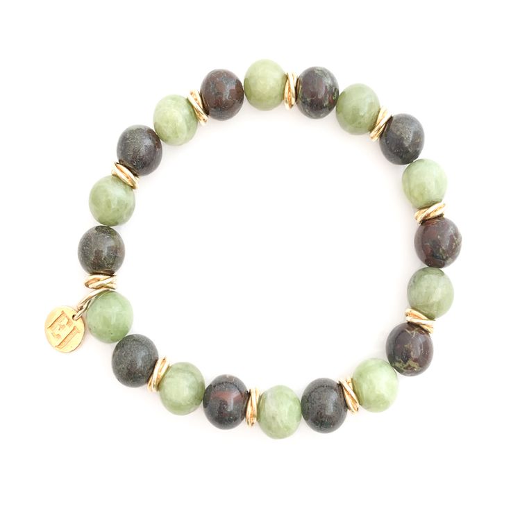 Green and brown beads with gold spacer accents Brown Stretch Bracelet With Wooden Beads, Earthy Gold Beaded Bracelets For Healing, Spiritual Brown Beaded Bracelets For Everyday, Brown Wooden Beads For Bracelets, Earthy Beaded Bracelets With Round Beads, Brown Wooden Beaded Bracelet, Earthy Beaded Bracelets For Everyday, Earthy Hand-strung Beaded Bracelets For Everyday, Spiritual Brown Stretch Bracelet With Polished Beads