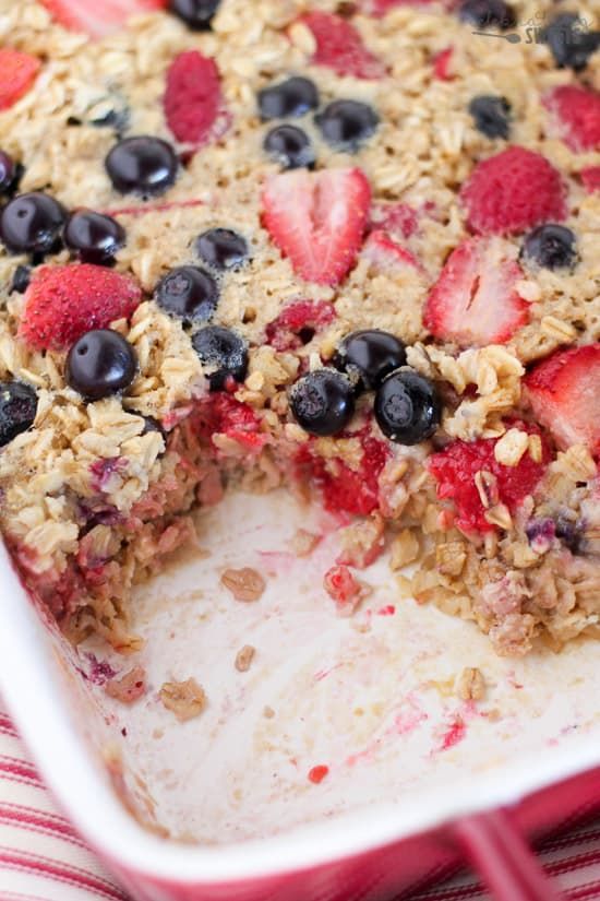 a berry and oatmeal dessert is cut in half