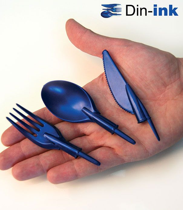 three forks and two spoons in the palm of a person's hand with din - ink on it