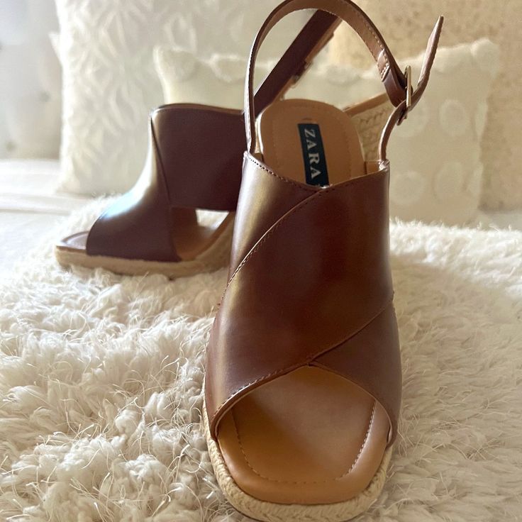 These Are Some Beautiful Brand-New, Never-Used Zara Platform Sandals. They Are Very Casual And Can Be Combined With Several Of Your Outfits. It Is Brown Leather Throughout And Beige Yarn On The Platform. The Platform Height Is 4 Inches. If You Have Any Questions Please Don't Hesitate To Ask! Summer Brown Open Heel Heels, Brown Wedge Heel Slingback Sandals For Spring, Chic Brown Synthetic Slingback Sandals, Zara High Heel Brown Sandals, Brown Synthetic Slingback Summer Sandals, Brown High Heel Slingback Sandals For Beach, Zara Brown High Heel Sandals, Brown Summer Heels With Removable Insole, Summer Brown Synthetic Slingback Sandals