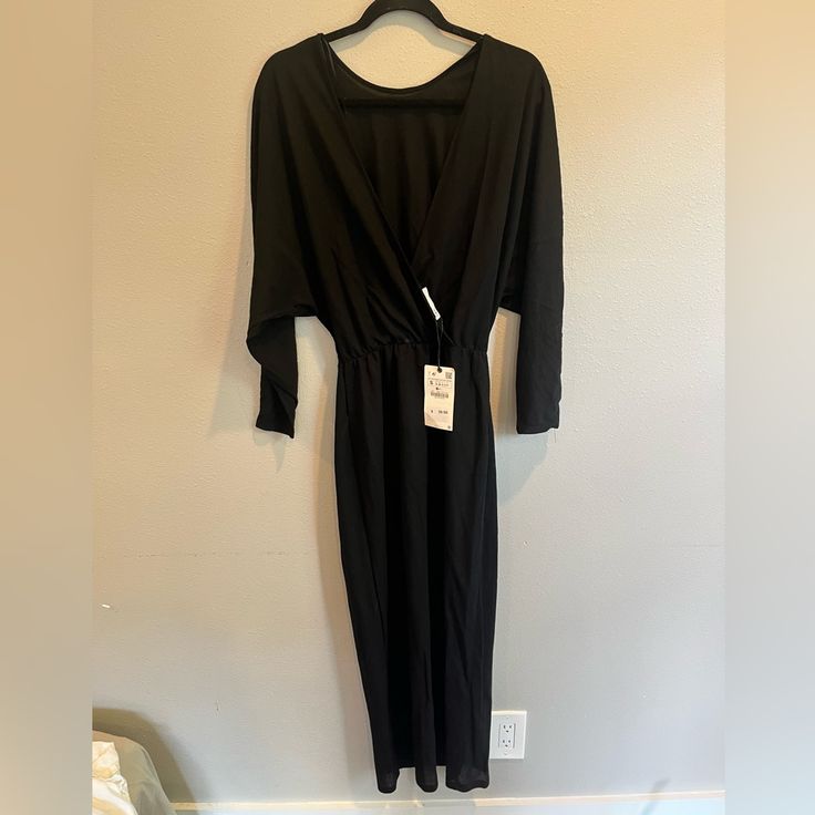 Dead Stock Zara Viscose/Polymide Long Wrap Front/Back Can Be Worn As A Dress Or Coverup Batwing Sleeves Elastic Stretch Waist Length From Waist 35” Black Spring Loungewear Dress, Black Long Maxi Dress For Loungewear, Black Maxi Dress For Loungewear, Spring Black Dresses For Loungewear, Black Dress For Spring Loungewear, Spring Black Maxi Dress For Loungewear, Black Maxi Dress For Spring Loungewear, Black Midi Dress For Spring Loungewear, Zara Stretch Maxi Dress For Night Out