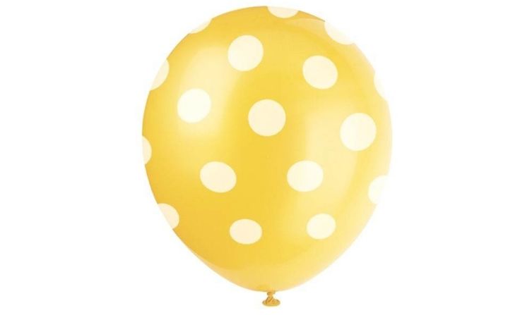 a yellow balloon with white polka dots on it