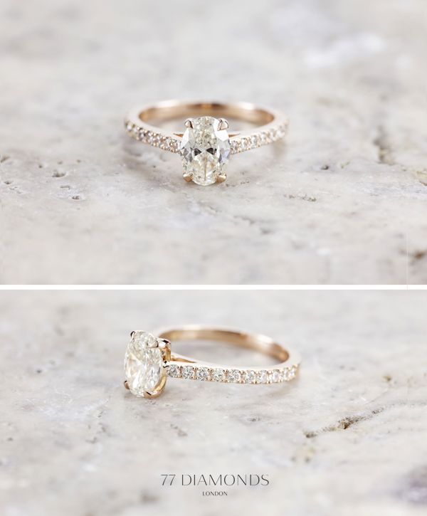 an oval cut diamond ring with pave set shoulders