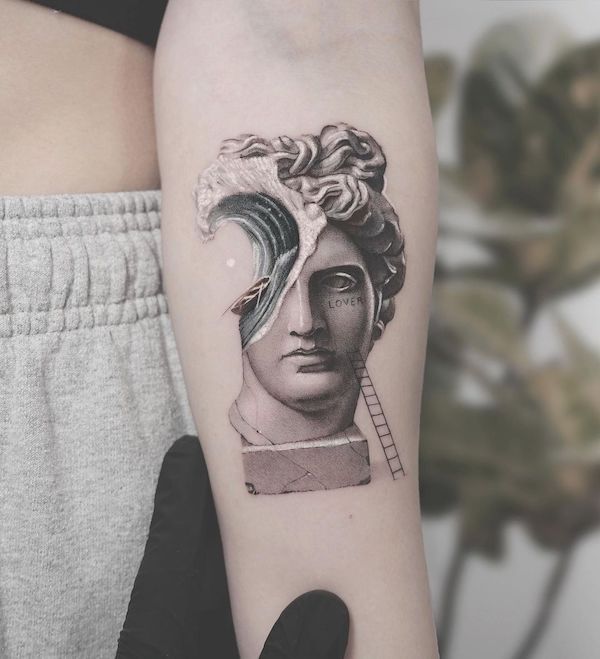 a woman's arm with a tattoo on it that has an image of a busture