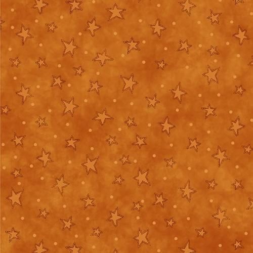 an orange background with brown stars