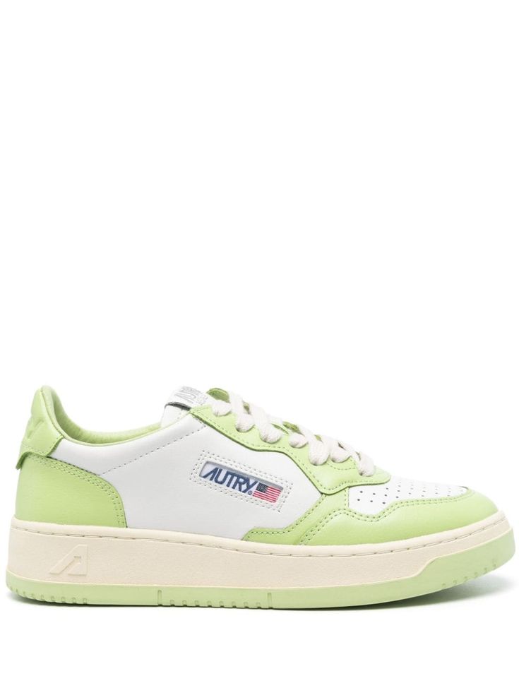 avocado green/white calf suede colour-block panelled design tonal stitching round toe perforated toebox logo patch to the side logo patch at the tongue branded heel counter padded ankle branded leather insole French terry lining logo at the sole flat rubber sole front lace-up fastening This piece comes complete with a protective dust bag. Autry Shoes, The Tongue, Logo Label, Avocado Green, Top Designer Brands, Low Sneakers, High End Fashion, Signature Design, Sneakers White