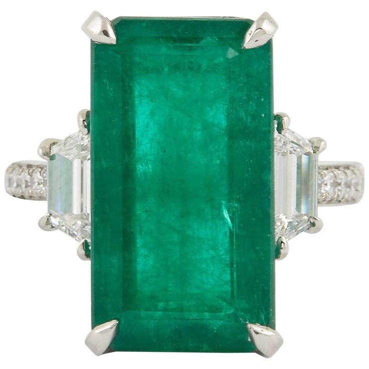 A Fabulous and Unique Green Emerald Ring!! 10.45 carat green emerald cut in a stunning elongated rectangular shape. 1.06 carats of round and special cut side diamonds all set in platinum. The ring is currently a size 6 but can easily be sized to any finger size. Antique Cocktail Ring, Green Emerald Ring, Emerald Diamond Ring, Detailed Jewelry, Mid Century Jewelry, Bypass Ring, Colombian Emeralds, Emerald Jewelry, Platinum Ring