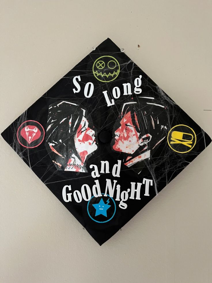 a graduation cap with the words so long and good night on it is hanging on a wall