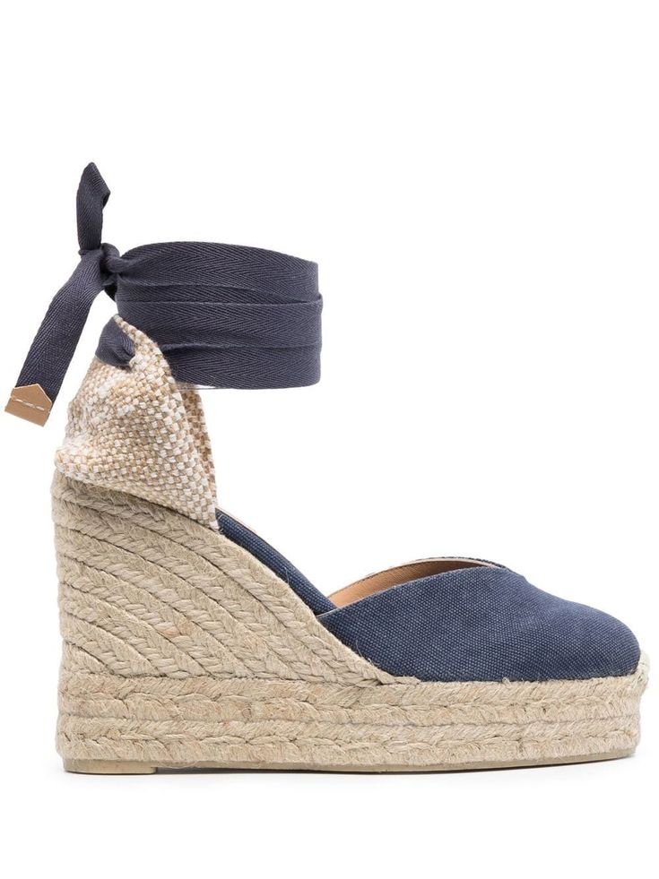 Chiara wedge-heel espadrilles from Castañer featuring navy blue, tie-fastening ankle strap, branded leather insole, round toe, braided raffia platform, braided raffia wedge heel and calf leather trim. | Castaner Chiara wedge-heel espadrilles Castaner Espadrilles, Ss 2024, Blue Espadrilles, Heeled Espadrilles, Navy Blue Tie, Women's Espadrilles, Stockholm Style, Wedge Espadrilles, Latest Fashion Design