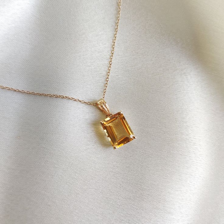 This stunning pendant is set in 14K Solid Yellow Gold with Natural Citrine with utmost precision. It is an unique gemstone pendant for nearly every occasion and is completely hassle-free jewelry. ITEM DETAILS * Gem: Citrine * Gem Size: 8X10mm * Gem Shape: Octagon * Gem Weight: 3.75 carats * Gold Purity: 14KT  * Gold Weight: 0.61 gram * Total Weight of the Pendant: 1.36 gram The Gold purity is guaranteed and it comes with authentic 14KT gold hallmark. Since my items are handmade, they are absolutely nickel and lead free. CUSTOMIZATION * Gemstone customization is available and it can be substituted with a gem of your choice. Kindly message me for the same. PACKAGING * The Pendant comes with layers of safe and secure wrapping along with Free handmade jewelry box with every purchase. ➡️Head to Luxury Yellow Gold Jewelry For May Birthstone, Topaz Jewelry Yellow, Luxury Citrine Gemstones For Gifts, Exquisite Yellow Gold Gemstones For Gifts, Octagon Shaped Citrine Jewelry In Yellow Gold, Yellow Gold Topaz Gemstones As Gift, Amber Citrine Gemstones For Gift, Orange Jewelry With 17 Jewels As A Gift, Yellow Gold Citrine Gemstones For Gift