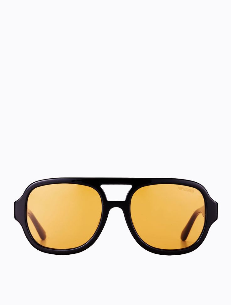 Classic vintage style aviators crafted in high quality shiny black acetate with contrasting dark yellow lens with Category 1 UV protection. Frame width: 145mmFrame height: 55mm Yellow Lens Sunglasses, Bright Pants, Yellow Poppy, Poppy Lissiman, Sunglasses Yellow, Classic Vintage Style, Outfit Formulas, Dark Yellow, Gingham Print