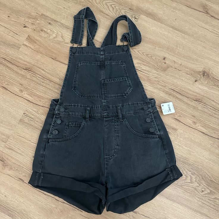 Brand New- Never Worn Size Xs Black Utility Overalls Romper, Black Utility Overalls Jumpsuit, Black Utility Overall Jumpsuits And Rompers, Black Utility Overall Jumpsuits, Spring Black Overalls With Pockets, Black Spring Overalls With Pockets, Black Overalls With Pockets, Trendy Black Overalls For Workwear, Black Denim Overalls For Spring