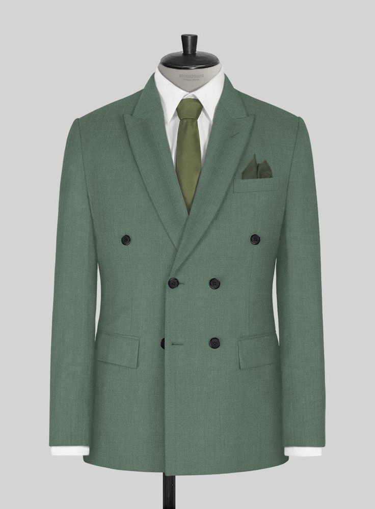 If you treat yourself to some new tailoring, you can't go wrong with our Sage Green Double Breasted Jacket, which offers a trendy statement-making ensemble that is both timeless and adaptable. Our super 120's wool jacket is made with a blend of wool and poly, whereas a solid pattern and green hue instantly give the outfit an eye-catching twist. An excellent option for a fantastic night out or attending a wedding.    Look Includes   Sage Green Fabric  Double Breasted Jacket Style  Peak Lapel   Ho Business Wool Blazer With Double-breasted Button, Wool Double-breasted Blazer For Business, Wool Double-breasted Business Blazer, Tailored Wool Coat With Concealed Placket For Semi-formal Occasions, Tailored Green Winter Suit, Wool Double-breasted Suits With Button Fastening, Wool Double-breasted Suits, Green Notch Lapel Suit For Winter, Wool Double Breasted Suit With Long Sleeves