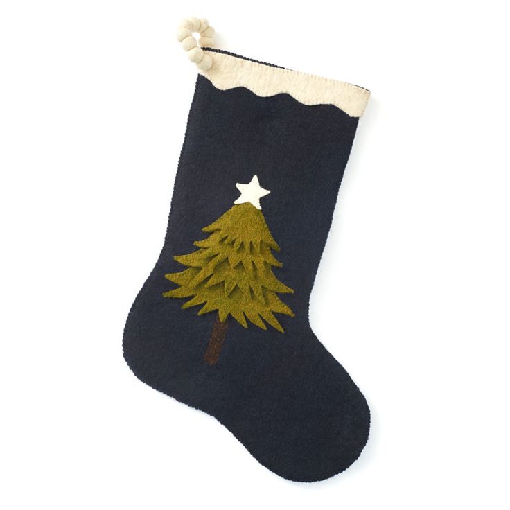 a christmas stocking with a tree on it