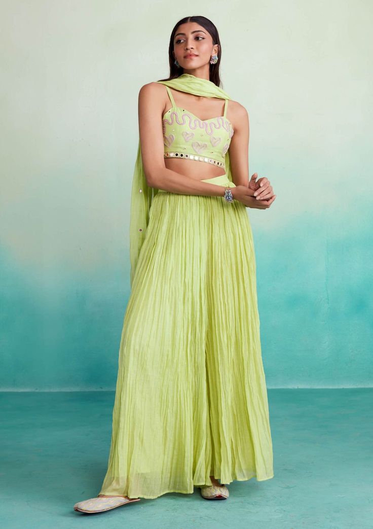 Introducing our zing sharara set in vibrant lime. This 3-piece ensemble includes a hand-embroidered crop top with heart motifs, a micropleated sharara, and a shisha embroidery dupatta. Made from lightweight chanderi fabric, it combines modern charm and comfort, perfect for any occasion. Embroidery Dupatta, Personal Shopping Service, Embroidered Crop Tops, Sharara Set, Photographic Lighting, Personal Shopping, Natural Fabrics, Personal Stylist, Hand Embroidered